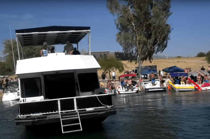 Drunk Idiot Yells at Another Drunk Idiot Driving a House Boat Into People