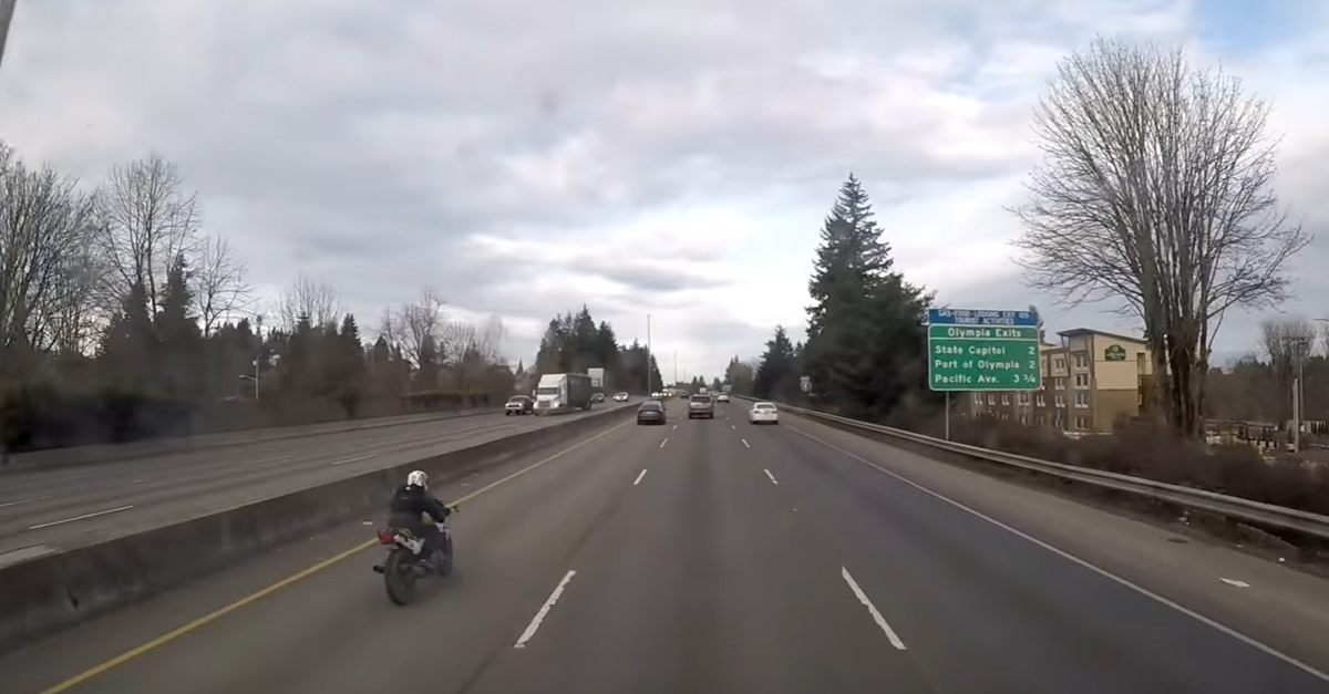 Speeding Motorcycle Crashes and Winds Up on the Trunk of Someone Else’s Car