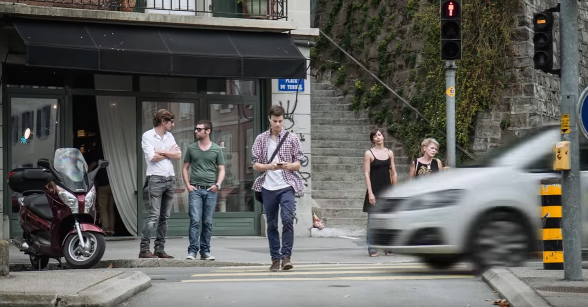 Man with Cell Phone Becomes Pavement Pizza in Brutal PSA