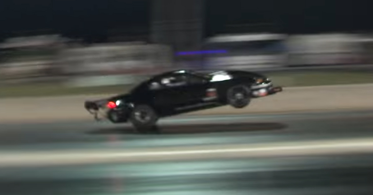 Mustang screams over the finish line at 195 mph with two wheels in the air  - alt_driver