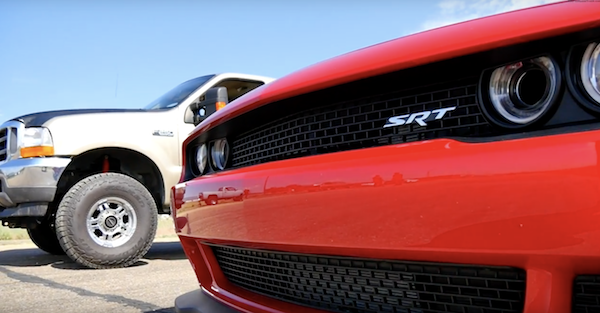 A coal rolling F-250 takes on a Challenger Hellcat