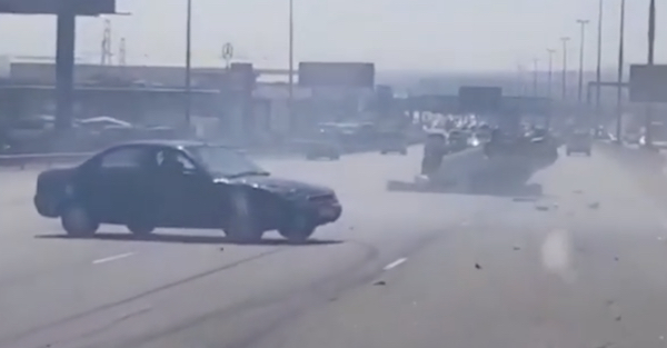 Car rams pickup on the highway and causes a spectacular crash