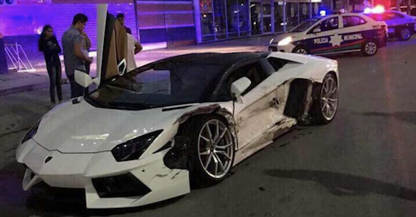 A Lamborghini Aventador owner has a strange reaction to being hit by a Taxi