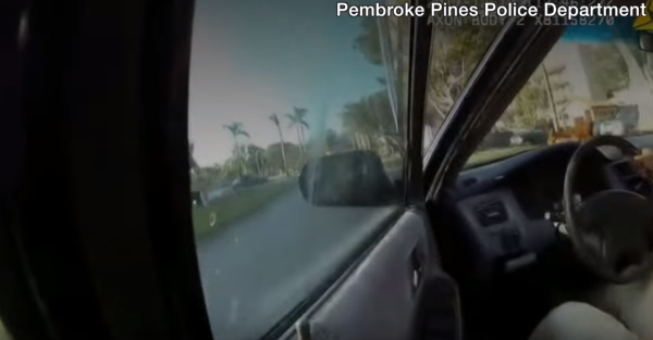 Watch the intense bodycam of an officer that wouldn’t let go of his suspect’s speeding car