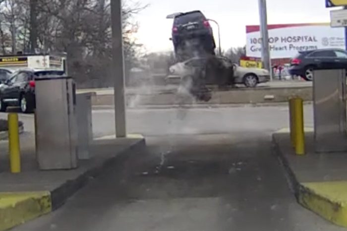 Driver Launches Over Car While Trying to Leave Bank in a Hurry