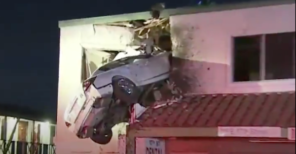 How a car ended up in the second story of this building is incredible