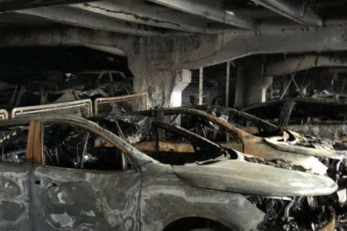 A massive parking garage fire took out a massive number of cars