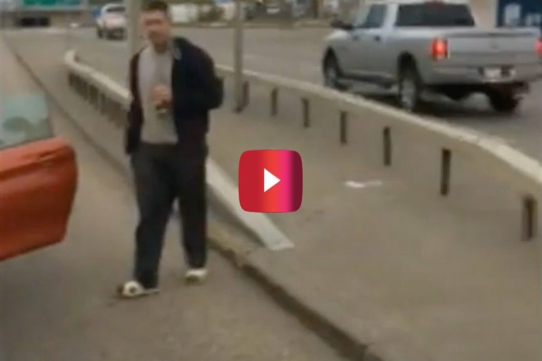 guy drinks beer after rear-ending car