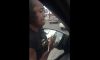 woman rips off car window