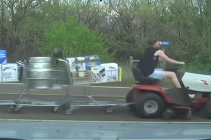 Redneck Prankster Tows 10 Shopping Carts on Riding Mower for Hilarious Video