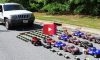 toy cars pulling real car