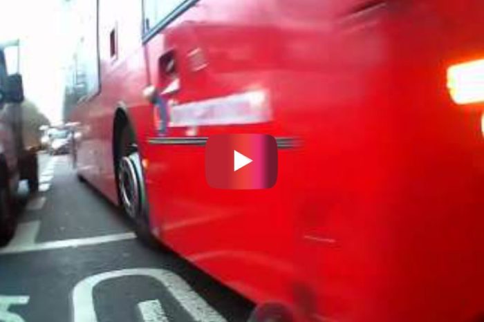 Bus Driver Runs a Red Light and Comes INCHES Away from Completely Flattening a Cyclist