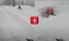 snowmobiler buried under several feet of snow