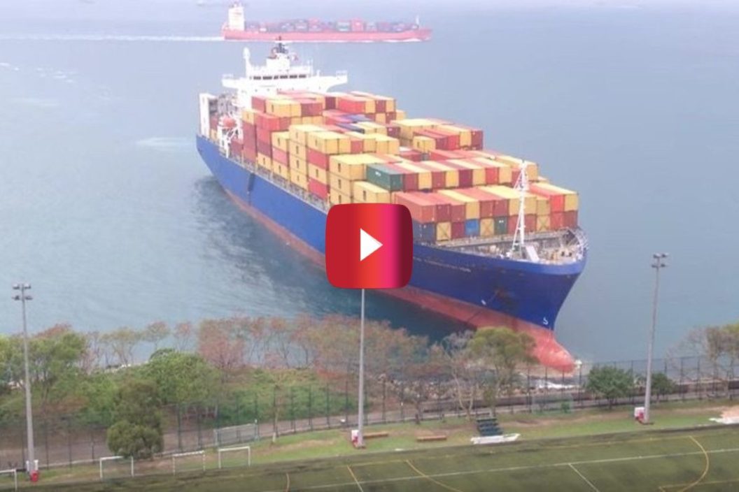 container ship nearly plows through field