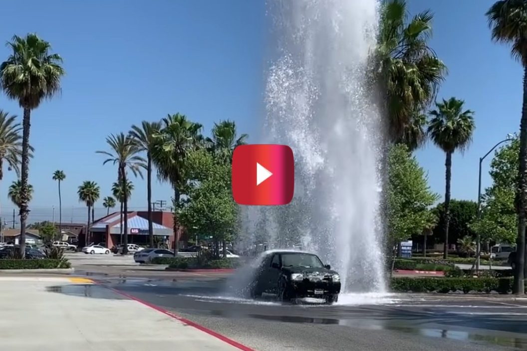 Cars Using Broken Fire Hydrant as Free Car Wash