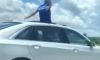 florida man standing through sunroof at 100 mph