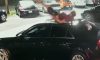 florida man falls on top of dealership car