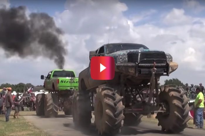 Coal-Spewing Monster Trucks Get the People Going at Tug of War Contest