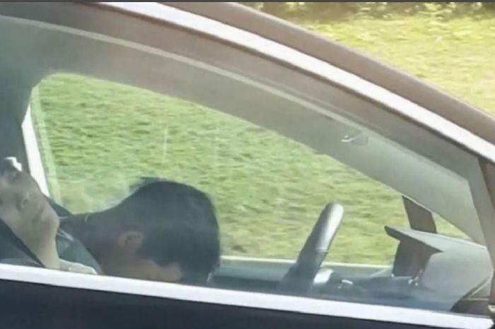 Real or Fake? Video Shows Tesla Driver Sleeping While Driving Down Highway