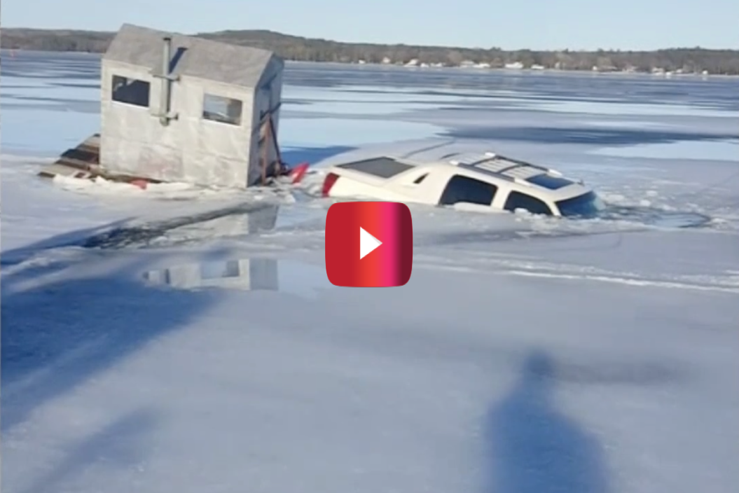 Truck Towing Ice Shanty Sinks Into Lake Michigan