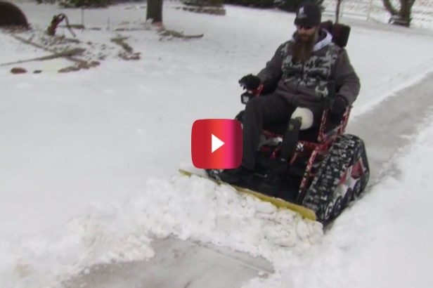This Wounded War Vet Plows Snow With His Modified Wheelchair