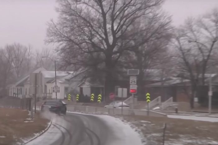 Car Slides Off Icy Road, Nearly Careens Into Row of Houses