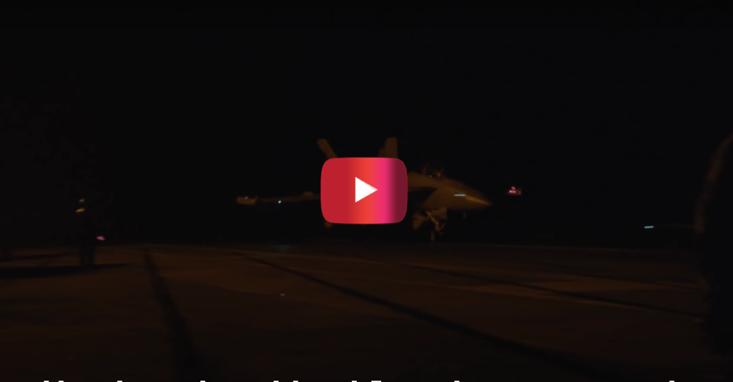 fighter jet landing at night