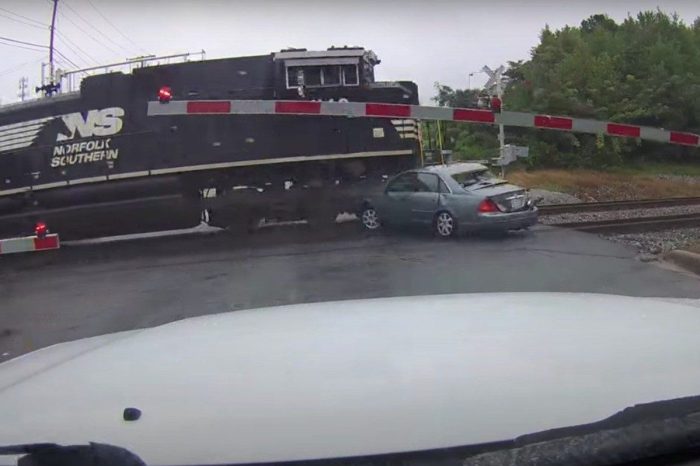 Train Plows Through Car After It Stalls on Tracks