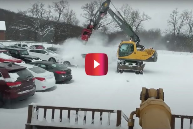 This Excavator With a Massive Blower Attachment Becomes an Incredible Snow Removal Machine
