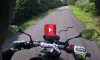 biker runs over snake
