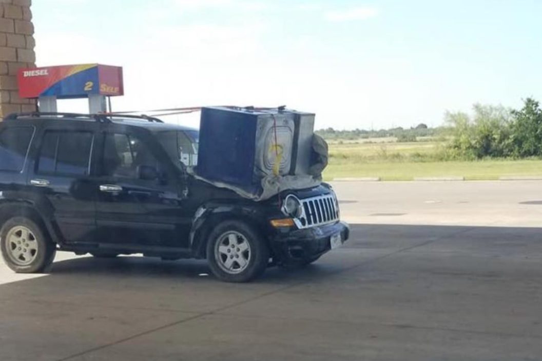 jeep owner hauling washing machine