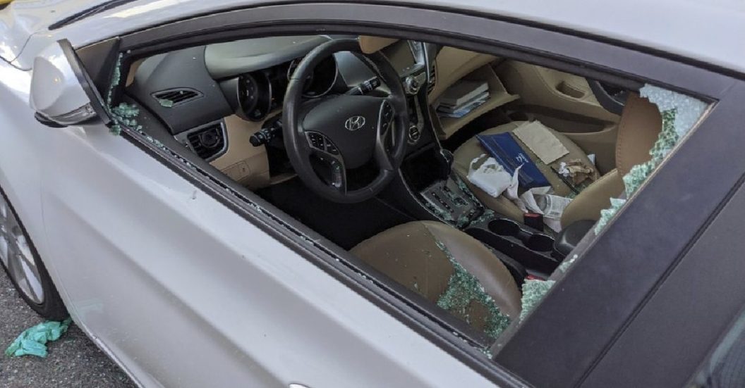 smashed driver's side window