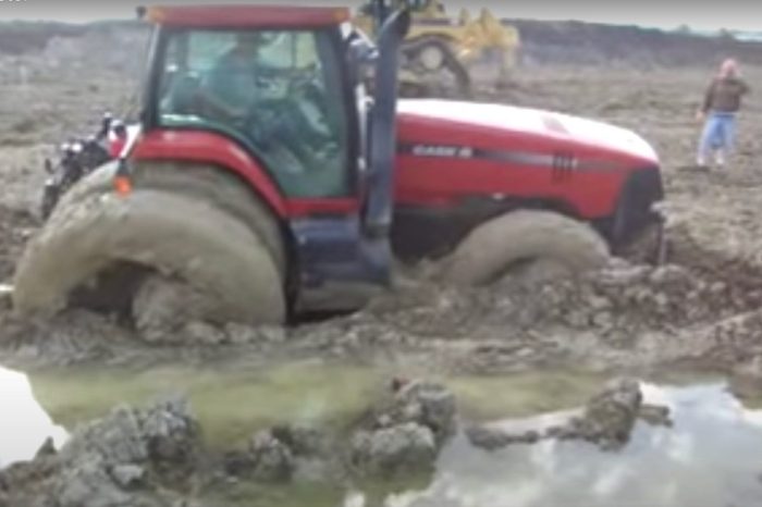 Tractor Stuck in the Mud Powers Its Way Through to Freedom