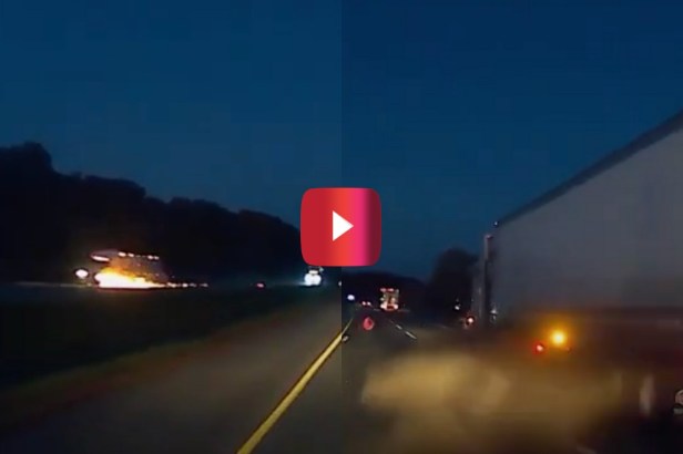 Flaming Tire Launches Across Median, Clips Semi Truck