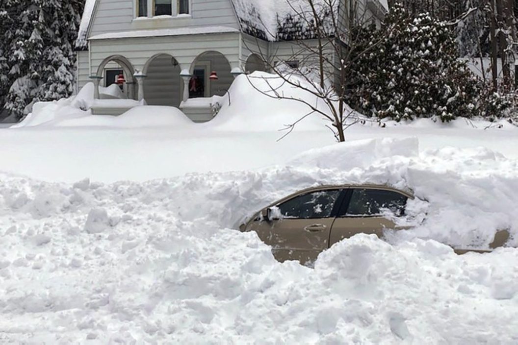 car trapped in snow