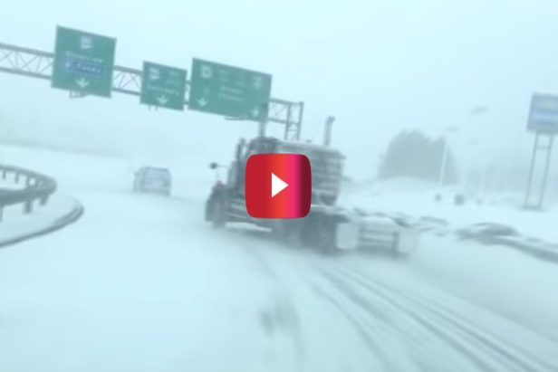 Trucker Throws Caution to the Wind and Goes Drifting on Snow-Covered Highway