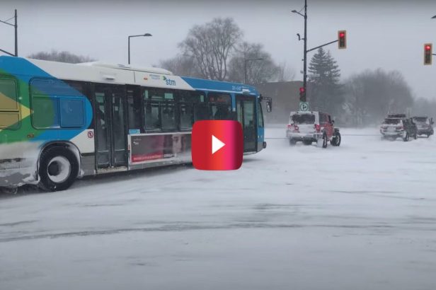 2 Toyota SUVs and a Jeep Wrangler Use Traction and Teamwork to Rescue a Bus From the Snow