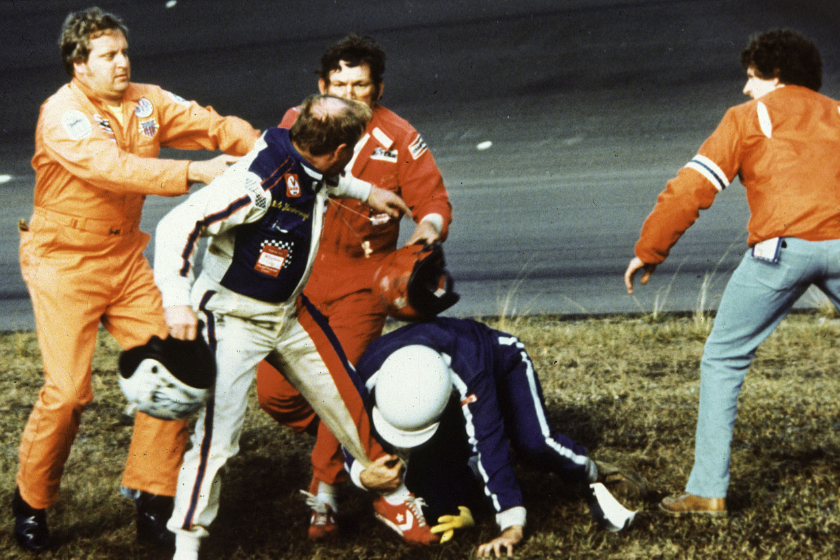 Track emergency workers try to break up a fight between Cale Yarborough, Donnie Allison and Bobby Allison after Yarborough and Donnie Allison crashed on the final lap while battling for the lead in the 1979 Daytona 500 at Daytona International Speedway