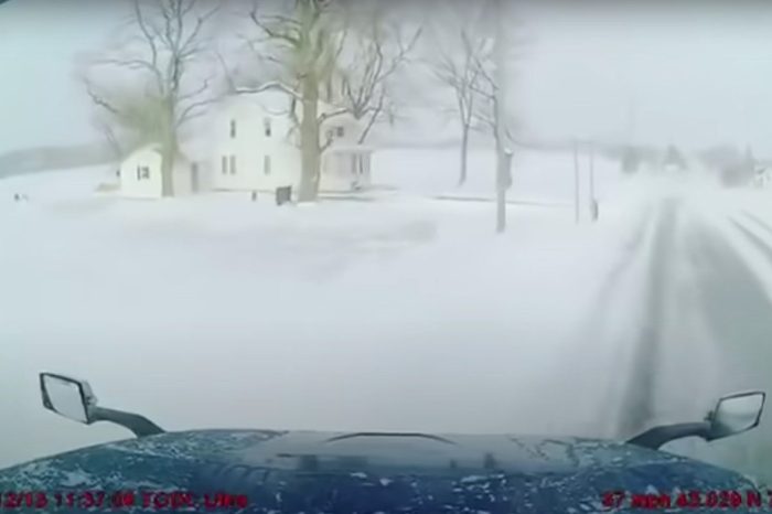 Trucker Loses Control and Slides Off the Road in Dangerous Winter Weather