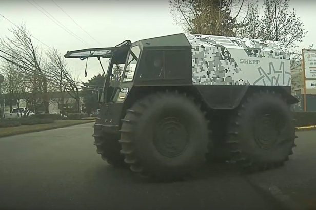 Off-Roading Vehicle With Massive Tires Shown on Dashcam Video