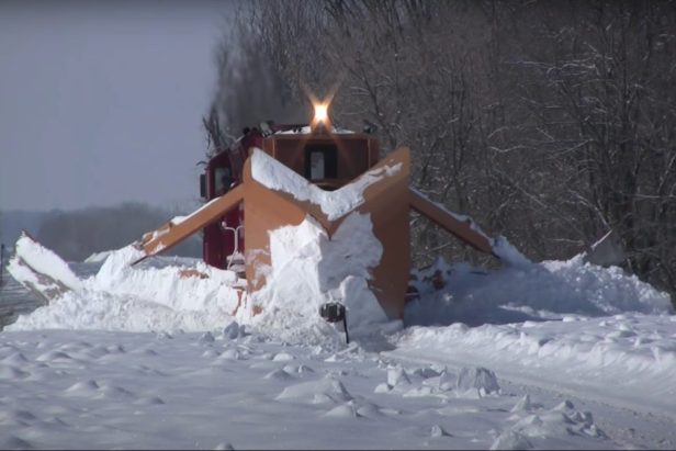 This Train With a Giant Plow on It Becomes the Ultimate Snow-Clearing Machine
