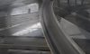 Driver plunges 70 feet off overpass ramp