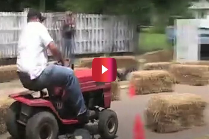 Tractor Driver Ends Up on His Butt During Obstacle Course Run