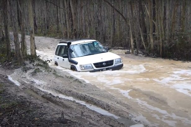 Subaru Forester Driver Takes on Treacherous Bog Hole and Barely Makes It