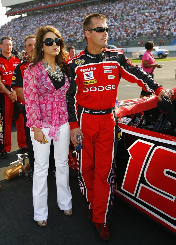 Jeremy Mayfield stands with his wife Shana next to his car prior to the NASCAR Nextel Cup Series Coca-Cola 600 at the Lowe's Motor Speedway on May 28, 2006