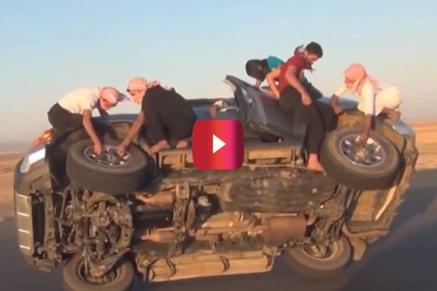 Folks With a Possible Death Wish Pulled Off This Absolutely Bonkers Tire-Changing Stunt