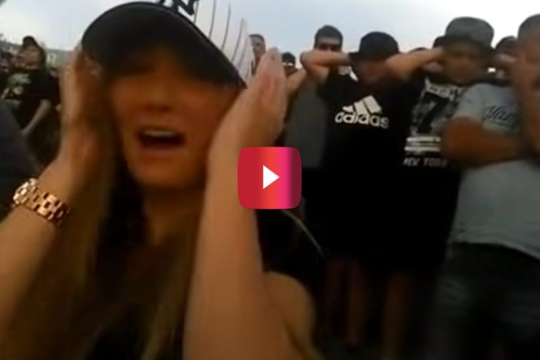 woman covers ears during first top fuel dragster event