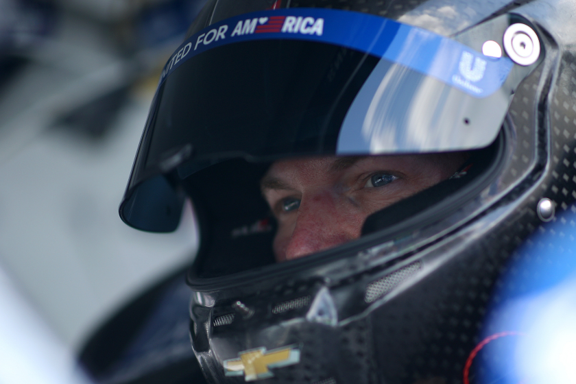 Dale Earnhardt Jr. sits in his car prior to the NASCAR Xfinity Series Go Bowling 250 at Richmond Raceway on September 11, 2021 in Richmond, Virginia
