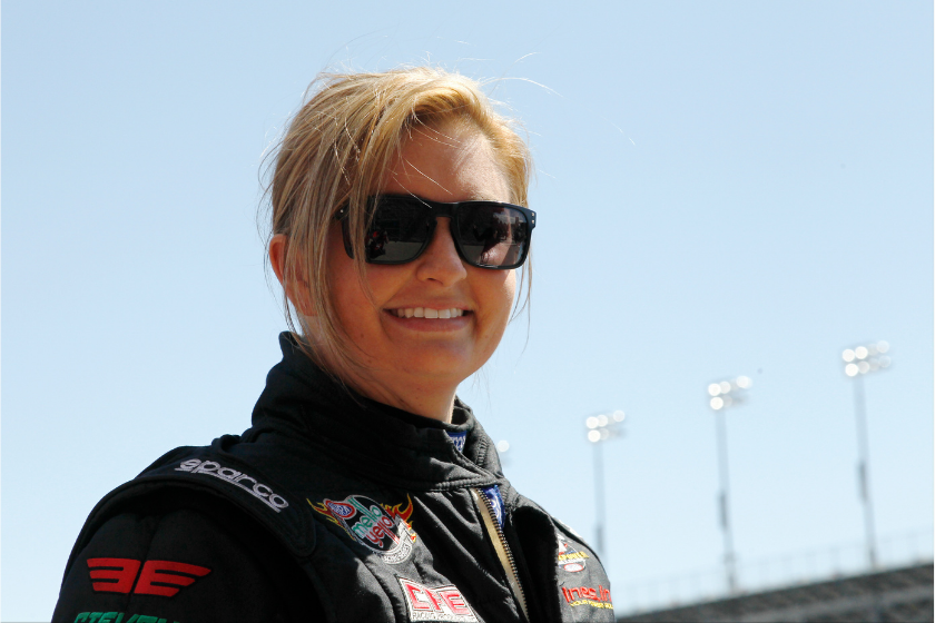 erica enders smiling with sunglasses on