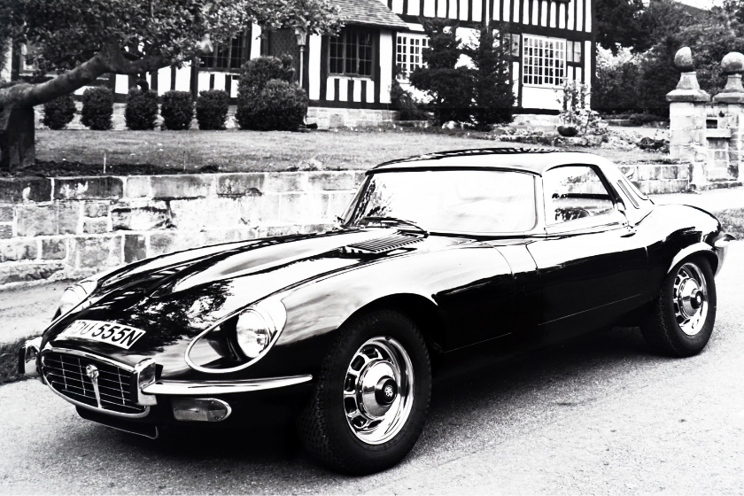 black and white photo of jaguar xk-e